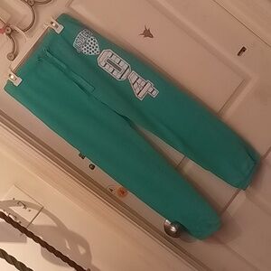 Kid's turquoise sweatpants from Justice size 12.